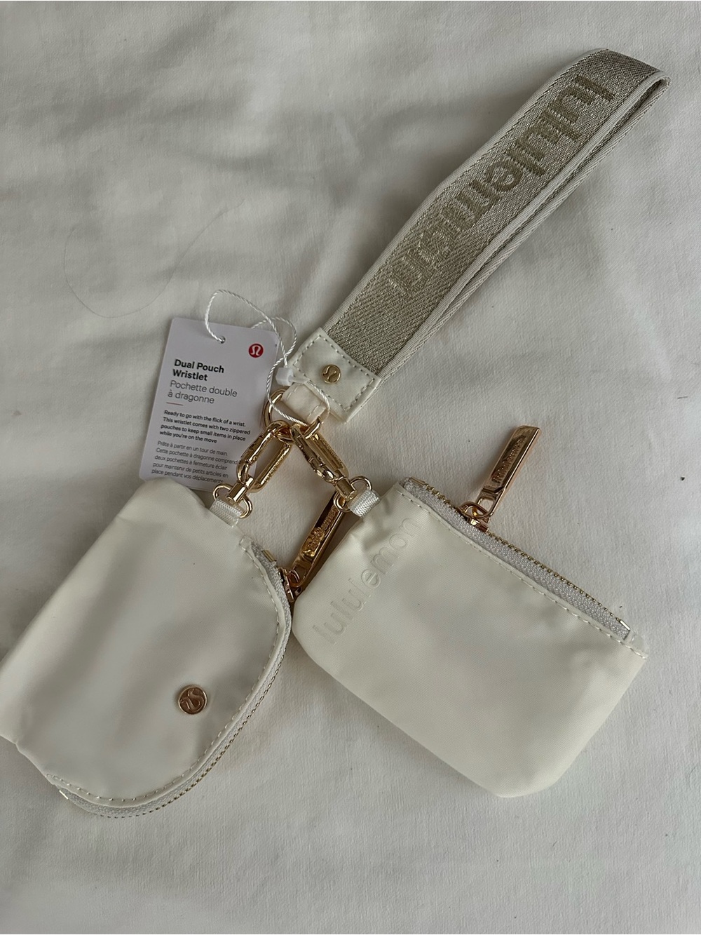 lululemon athletica Dual Pouch Wristlet in White/cream with Gold Hardware